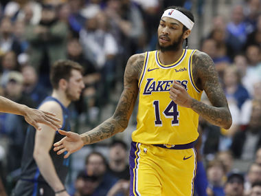 Los Angeles Lakers forward Brandon Ingram (14) is congratulated after scoring during the the second half of an NBA basketball game against the Dallas Mavericks in Dallas, Monday, Jan. 7, 2019. (AP Photo/LM Otero)