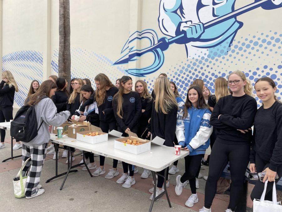 Pictured above is CdM’s cheer squad hosting November/December’s Welcome Wednesday. Photo courtesy of Kaydence Osgood.