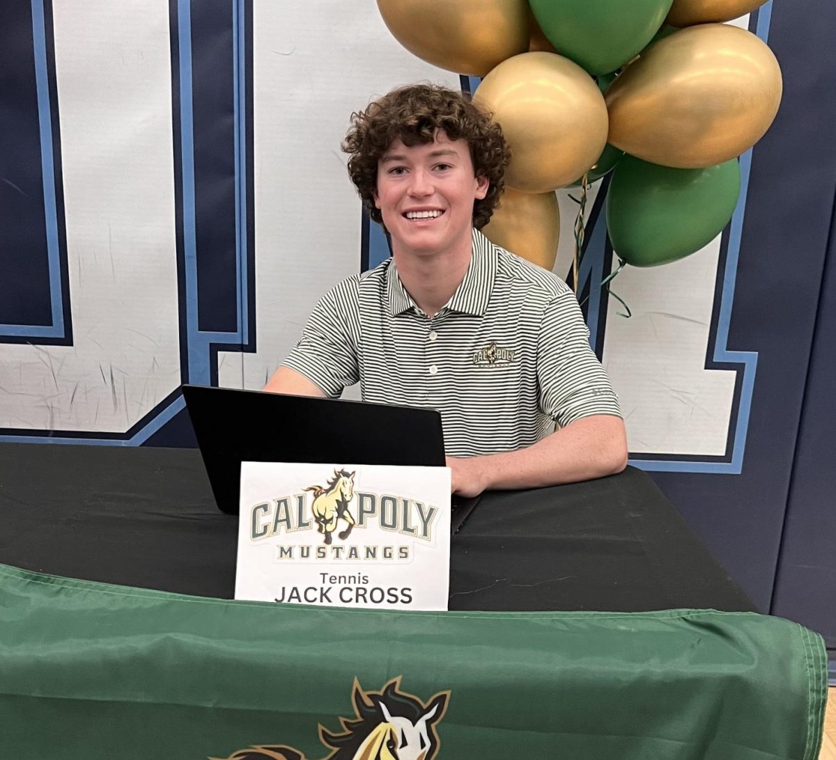 Jack Cross signing the National Letter of Intent. Photo courtesy of Sarah Cross.
