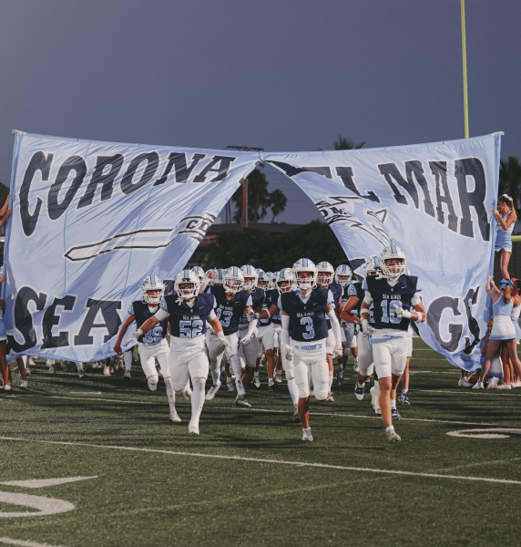 CdM Football team entering Davidson Field for kickoff. Photo courtesy of Luke Lawrence visuals.ll on Instagram


